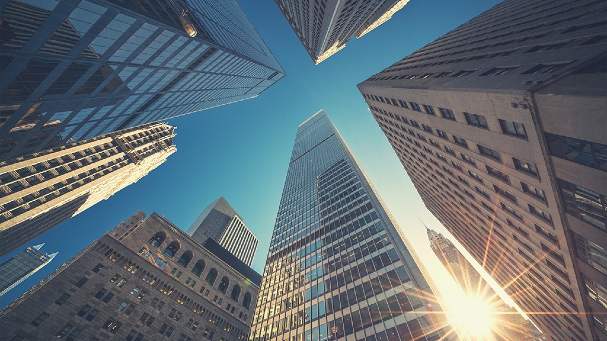 Office building top view background in retro style colors. Manhattan buildings of New York City center - Wall street